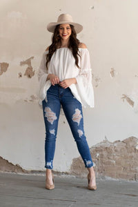 LIGHT MID WASH RIPPED SKINNY ANKLE JEANS